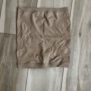Shapewear. No size but fits like a small or medium